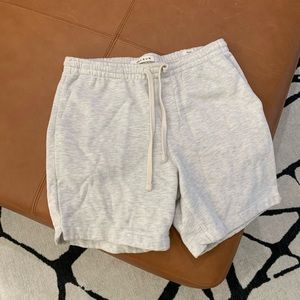 Beige men’s sweat-shorts with drawstring. Comes just above the knee